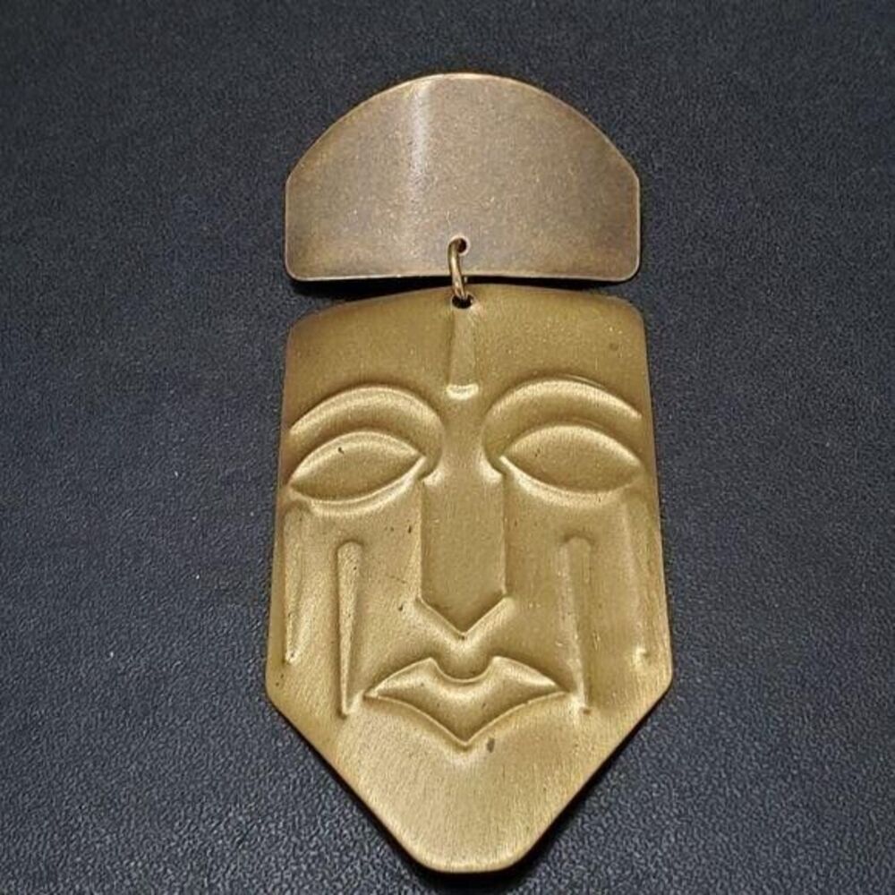Vintage bronze tone mask brooch
